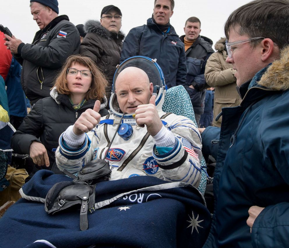 PHOTO: Commander Scott Kelly of NASA rests in a chair outside of the Soyuz spacecraft minutes after he and two Russian cosmonauts landed in a remote area on March 2, 2016 near the town of Zhezkazgan, Kazakhstan.