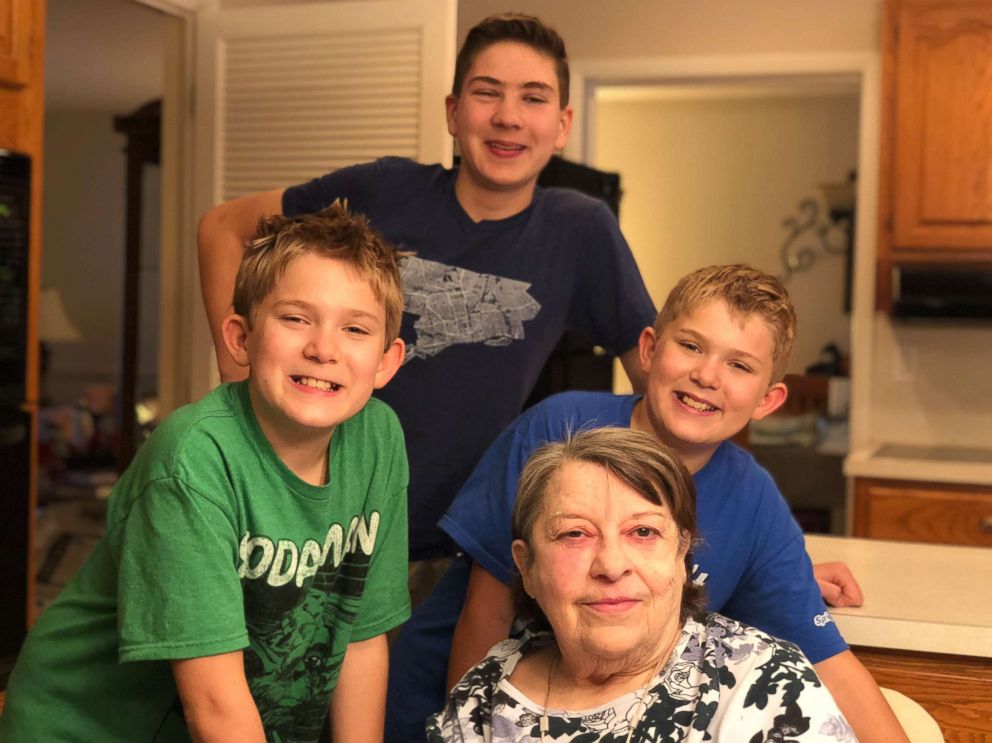 PHOTO: Scott's mother with his three sons. 