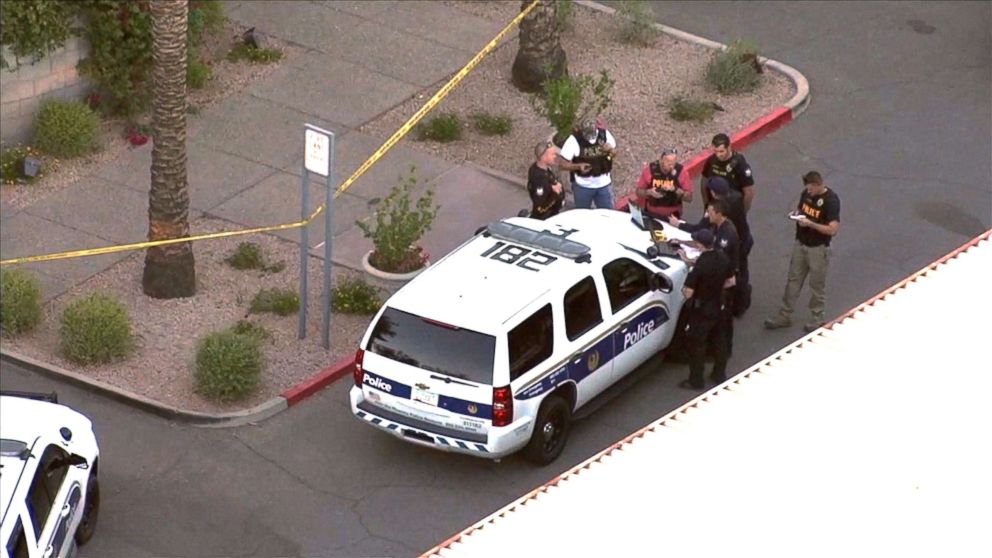 PHOTO: Law enforcement officers investigate a crime scene in Scottsdale, Ariz.