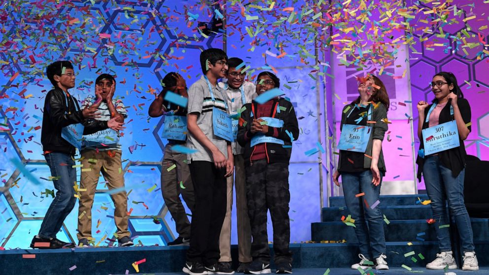 PHOTO: The eight co-champions of the 2019 Scripps National Spelling Bee, from left, Sohum Sukhatankar, Abhijay Kodali, Rohan Raja, Saketh Sundar, Christopher Serrao, Rishik Gandhasri, Erin Howard and Shruthika Padhy, celebrate their win.