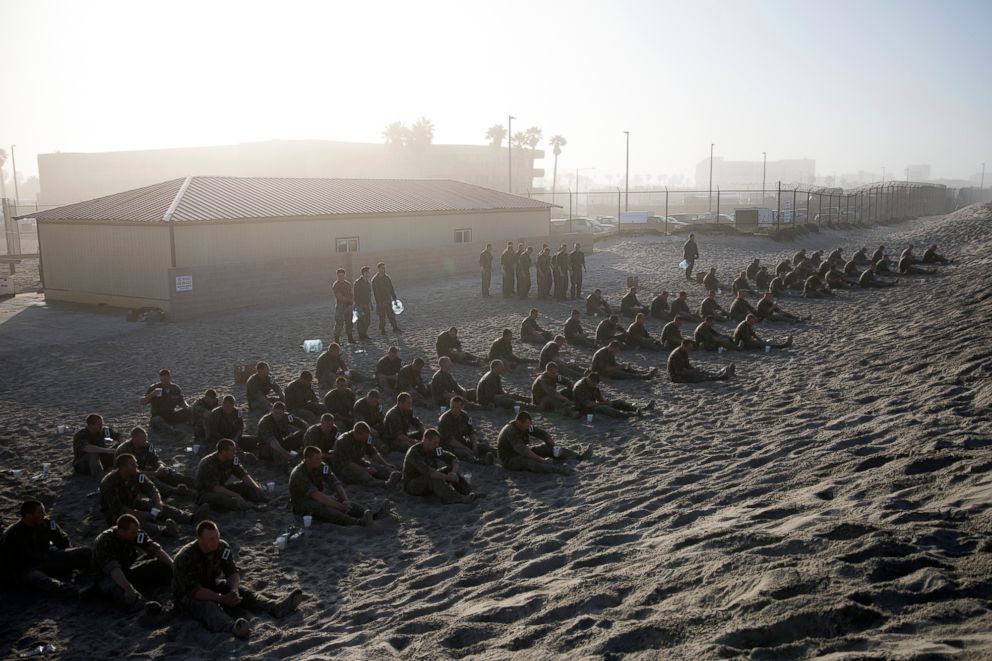 PHOTO: Navy SEAL candidates participate in Basic Underwater Demolition/SEAL (BUD/S) training.