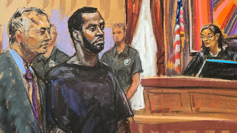 PHOTO: Sean "Diddy" Combs and his defense lawyer Marc Agnifilo stand before Magistrate Judge Tarnofsky after prosecutors brought three criminal charges against him in federal court in the Manhattan, New York City, Sept. 17, 2024 in this courtroom sketch. 