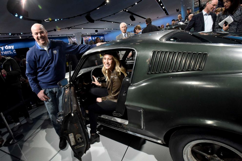 PHOTO: Sean Kiernan and Molly McQueen, the granddaughter of Steve McQueen, pose in Kiernan's 1968 Mustang GT at the Detroit auto show, Jan. 14, 2018, in Detroit, Michigan.