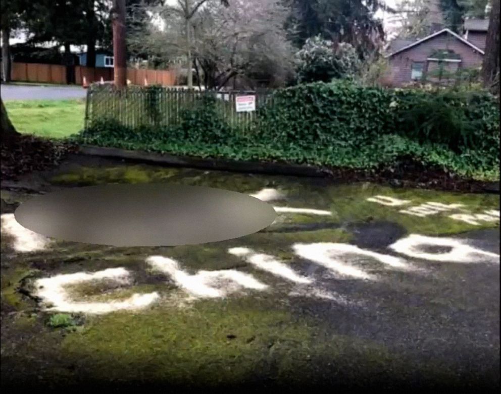 PHOTO: Racist anti-China graffiti messages were written with hay in large block letters in the parking lot of the International Full Gospel Fellowship Church in Seattle. The phrases included expletives and spelled out the message "CHINA, YOU WILL PAY."