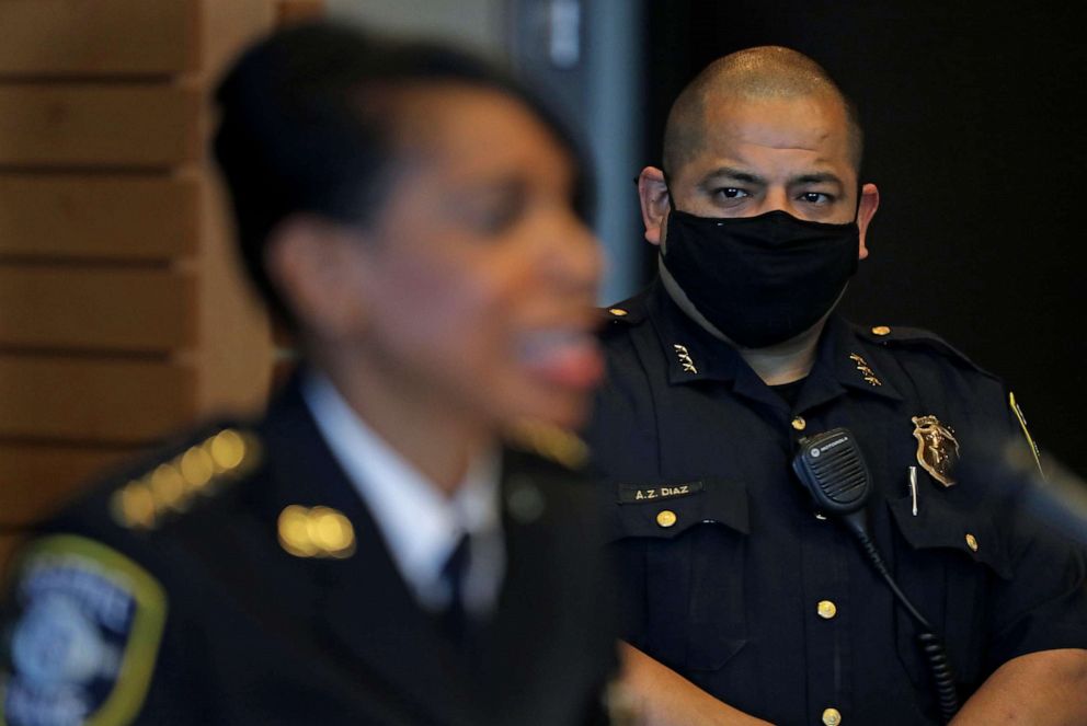 PHOTO:Police Chief Carmen Best announces her resignation as Deputy Police Chief Adrian Diaz, looks on, at a news conference, Seattle, Aug. 11, 2020. 