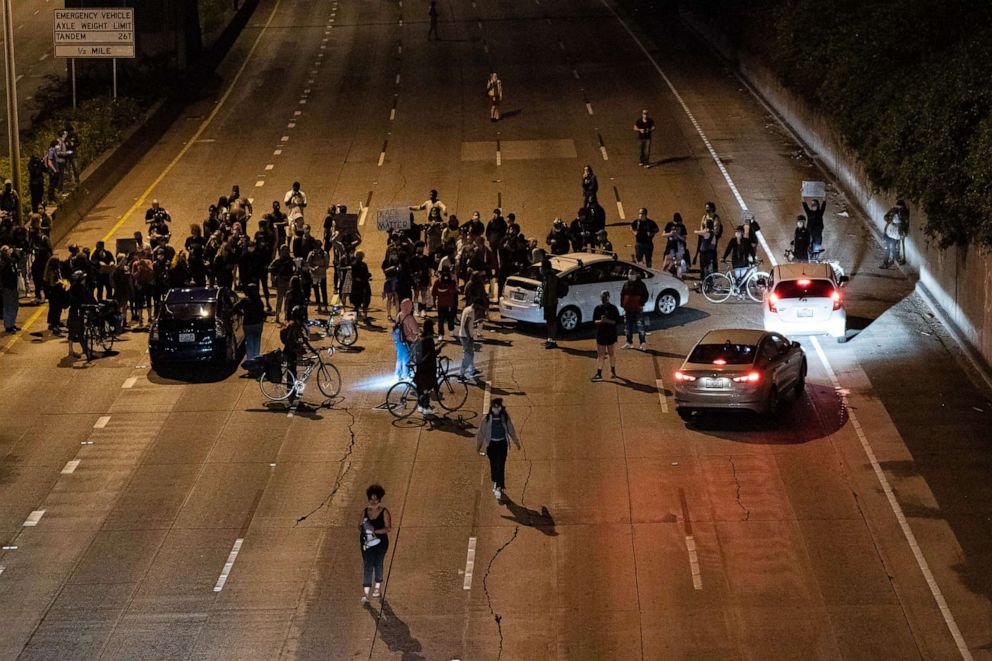 PHOTO: Protesters block Interstate 5 after marching from the area known as the Capitol Hill Organized Protest (CHOP) on June 24, 2020 in Seattle.