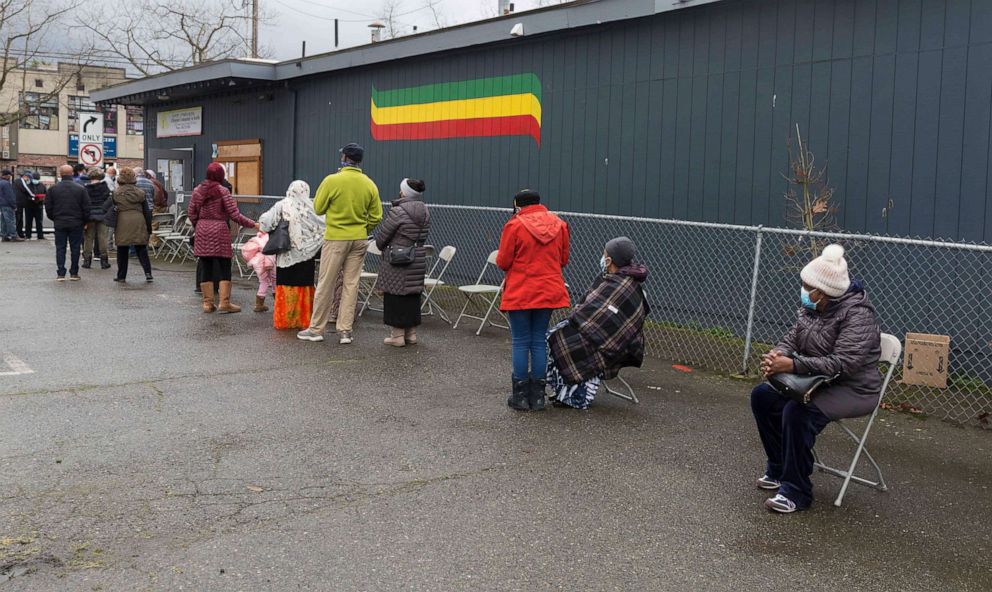 PHOTO: Patients line up at a pop up vaccination clinic in Seattle on Feb. 5, 2021.