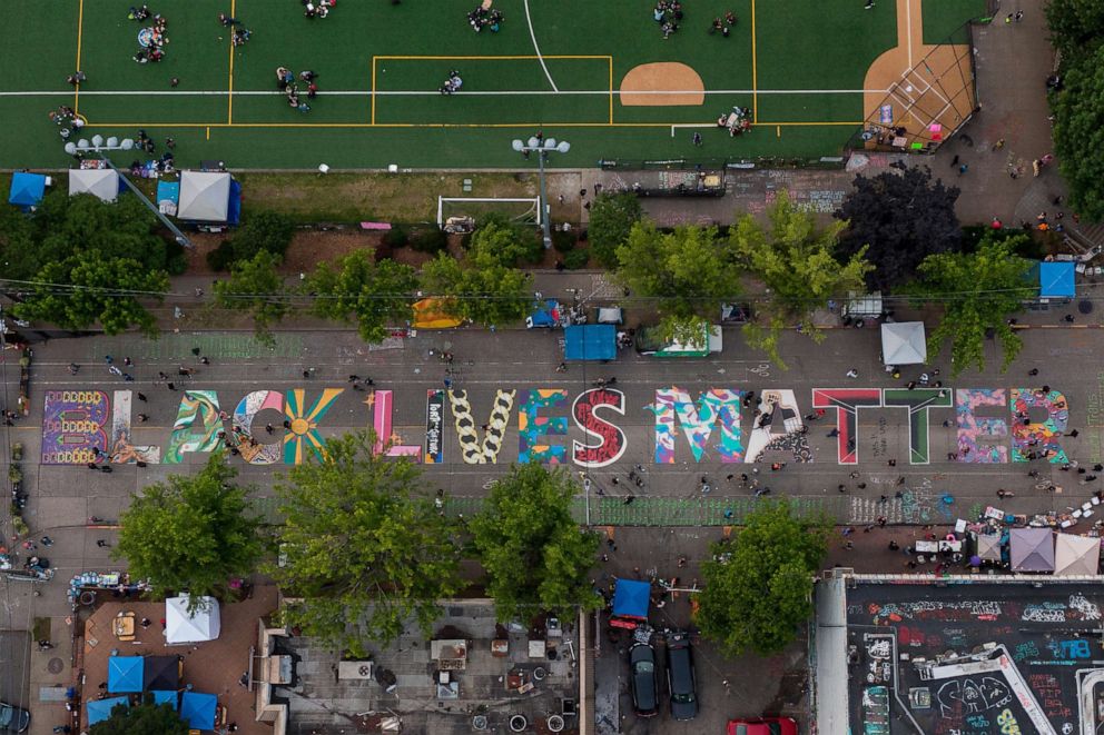 PHOTO: An aerial view of a Black Lives Matter mural on East Pine Street near Cal Anderson Park is seen during ongoing Black Lives Matter events on June 14, 2020 in Seattle.