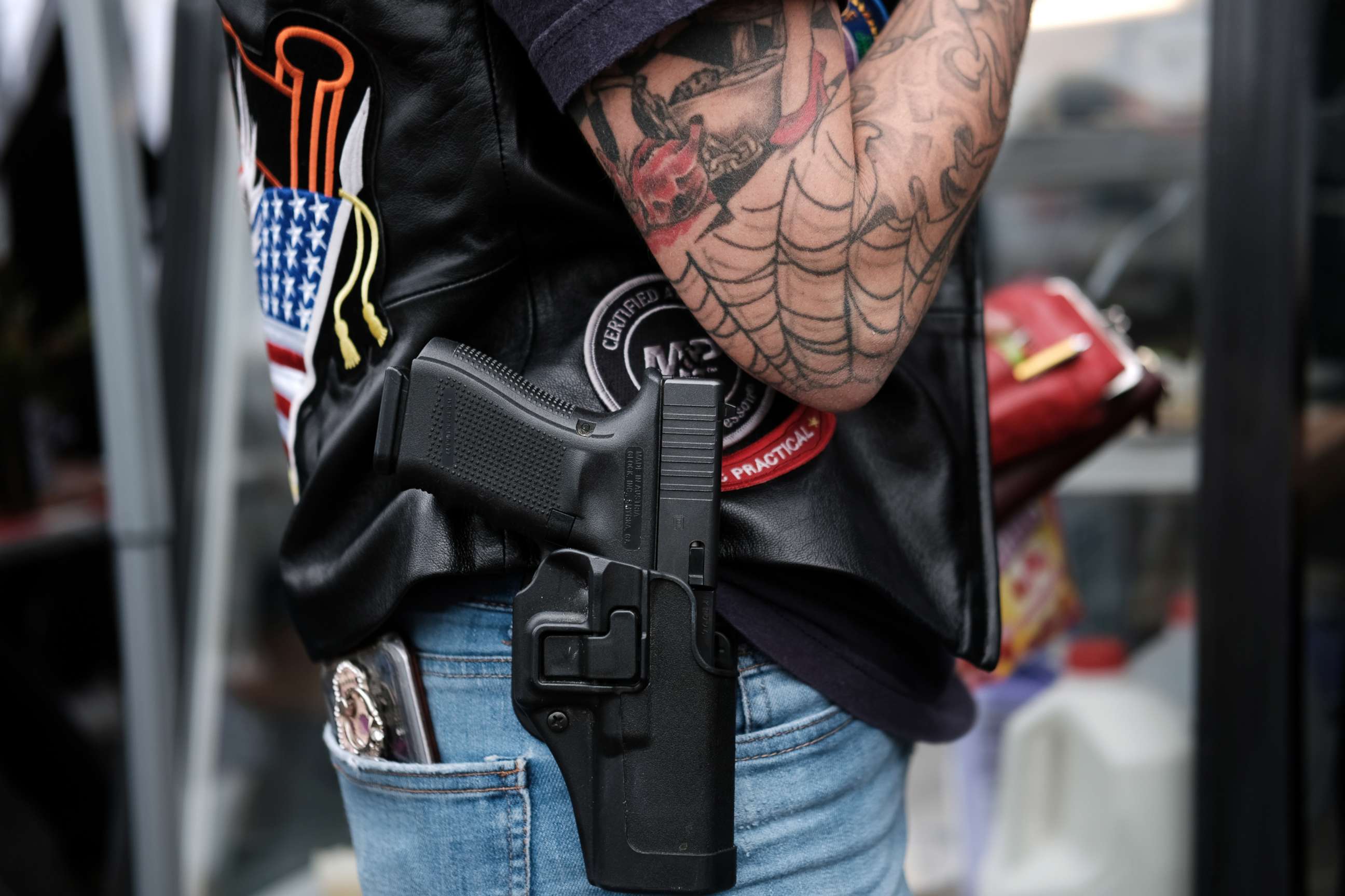 PHOTO: A member of the public carries a pistol during a second amendment rally on Oct. 12, 2019, in Greeley, Pa.