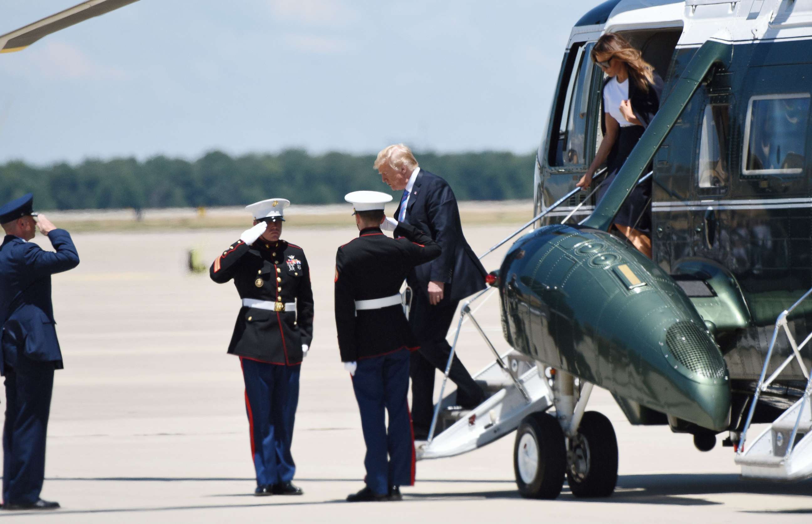 PHOTO: President Donald Trump and First Lady Melania Trump arrive to pay their respects to fallen Secret Service Special Agent Nole Edward Remagen who died after suffering a stroke while on duty in Scotland, on July 18, 2018 at Joint Base Andrews, Md.