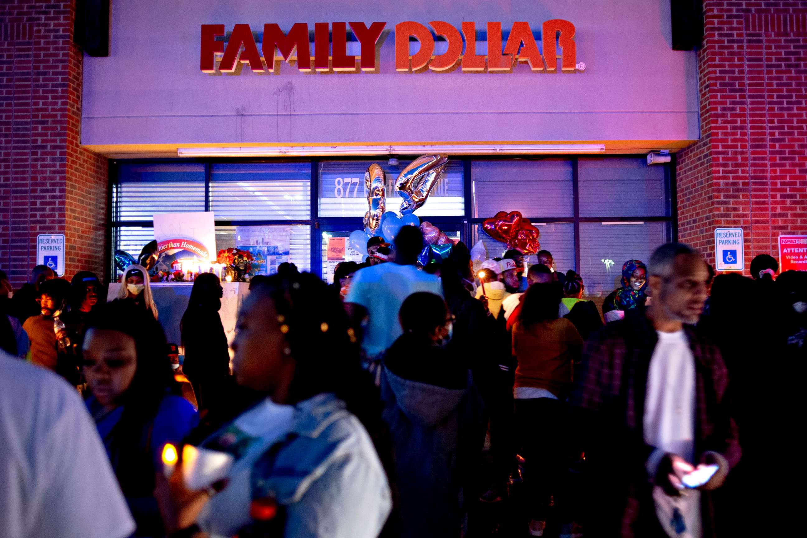 PHOTO: People gather to commemorate the life of Calvin Munerlyn during a vigil, in Flint, Mich. May 3, 2020. Munerlyn was a security guard at Family Dollar, who refused to let a woman the store without a mask.