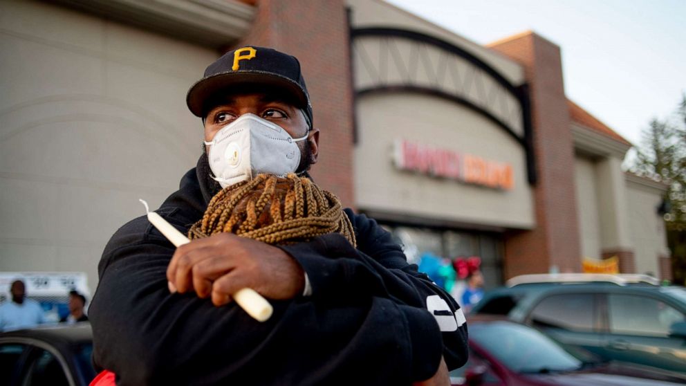 Protests and violence occurring on both sides as people deride others for wearing and not wearing face masks.