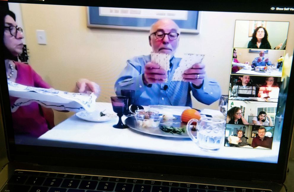 PHOTO: Rabbi Jeffrey Bennett of Temple Sinai in Newington, Connecticut, hosts a virtual community Seder on Zoom during the first night of Passover, as seen on a laptop computer in Washington, D.C., April 8, 2020.