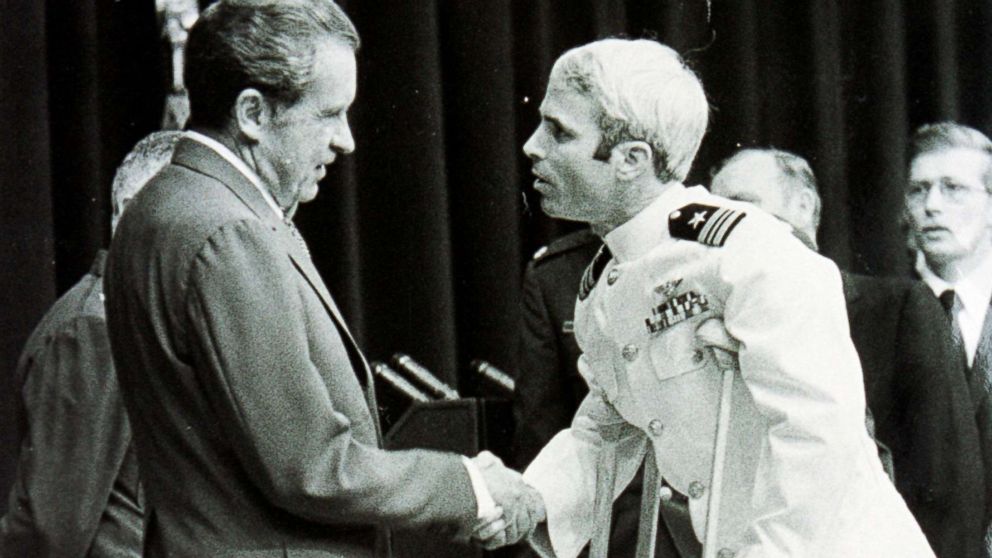 PHOTO: Lieutenant Commander John McCain is welcomed by President Richard Nixon upon his release as a POW during the Vietnam War, May 24, 1973, in Washington.