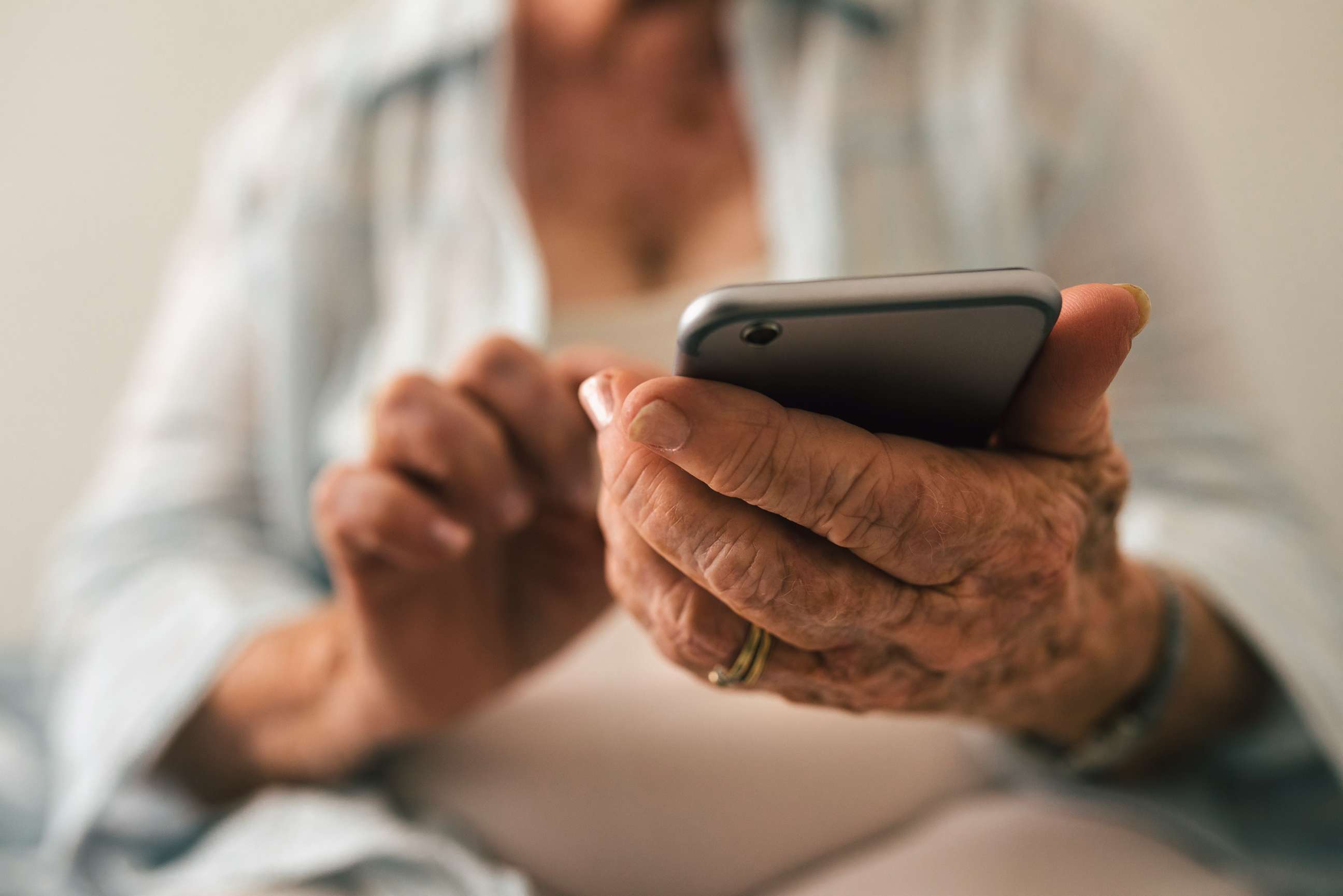 PHOTO: A senior citizen uses a cell phone in an undated stock photo.