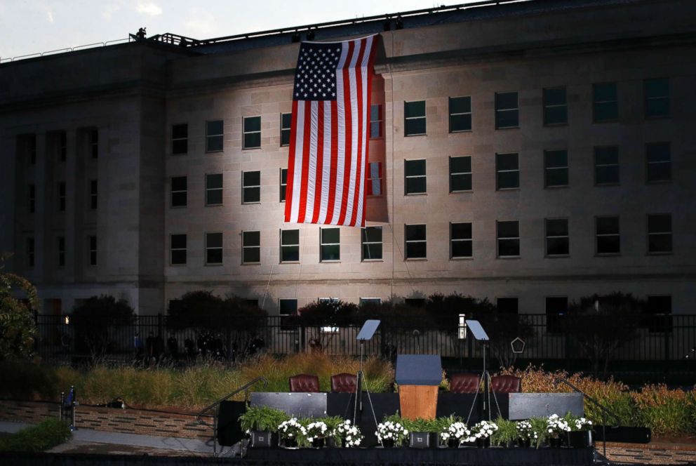 PHOTO: The podium awaits the arrival of President Donald Trump as a U.S. flag is unfurled at the Pentagon on the 16th anniversary of the September 11th attacks, Sept. 11, 2017. 