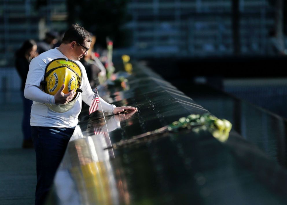 PHOTO: James Taormina, whose brother Dennis Taormina was killed during the Sept. 11 attacks stands by the side of the north waterfall pool before the a ceremony at ground zero in New York, Sept. 11, 2017. 