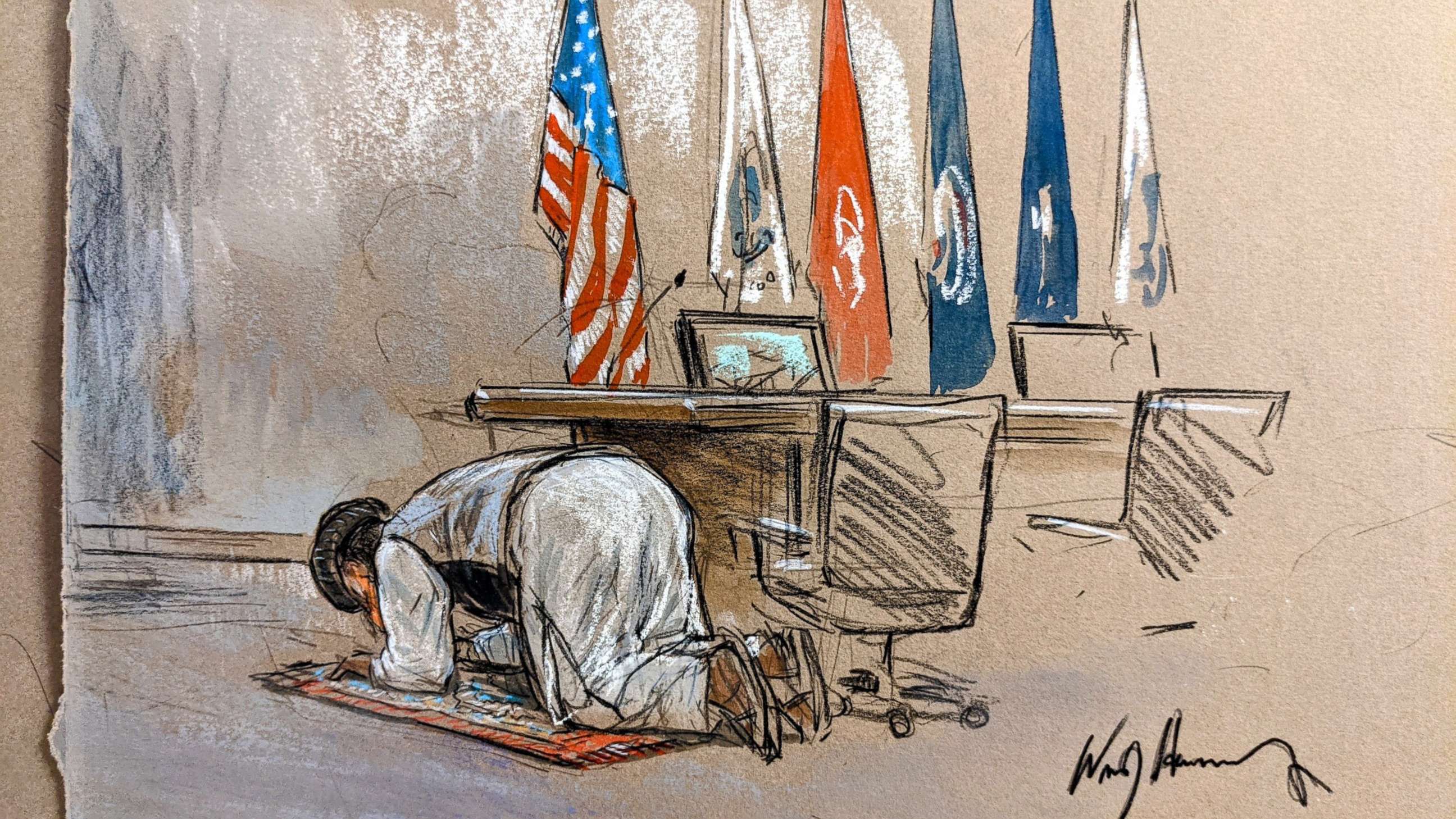 PHOTO: Khalid Sheikh Mohammed, self-proclaimed mastermind of the 9/11 terrorist attacks, kneels to pray during pretrial proceedings at a military commission on Sept. 8, 2021, at Camp Justice, Guantanamo Bay, Cuba.