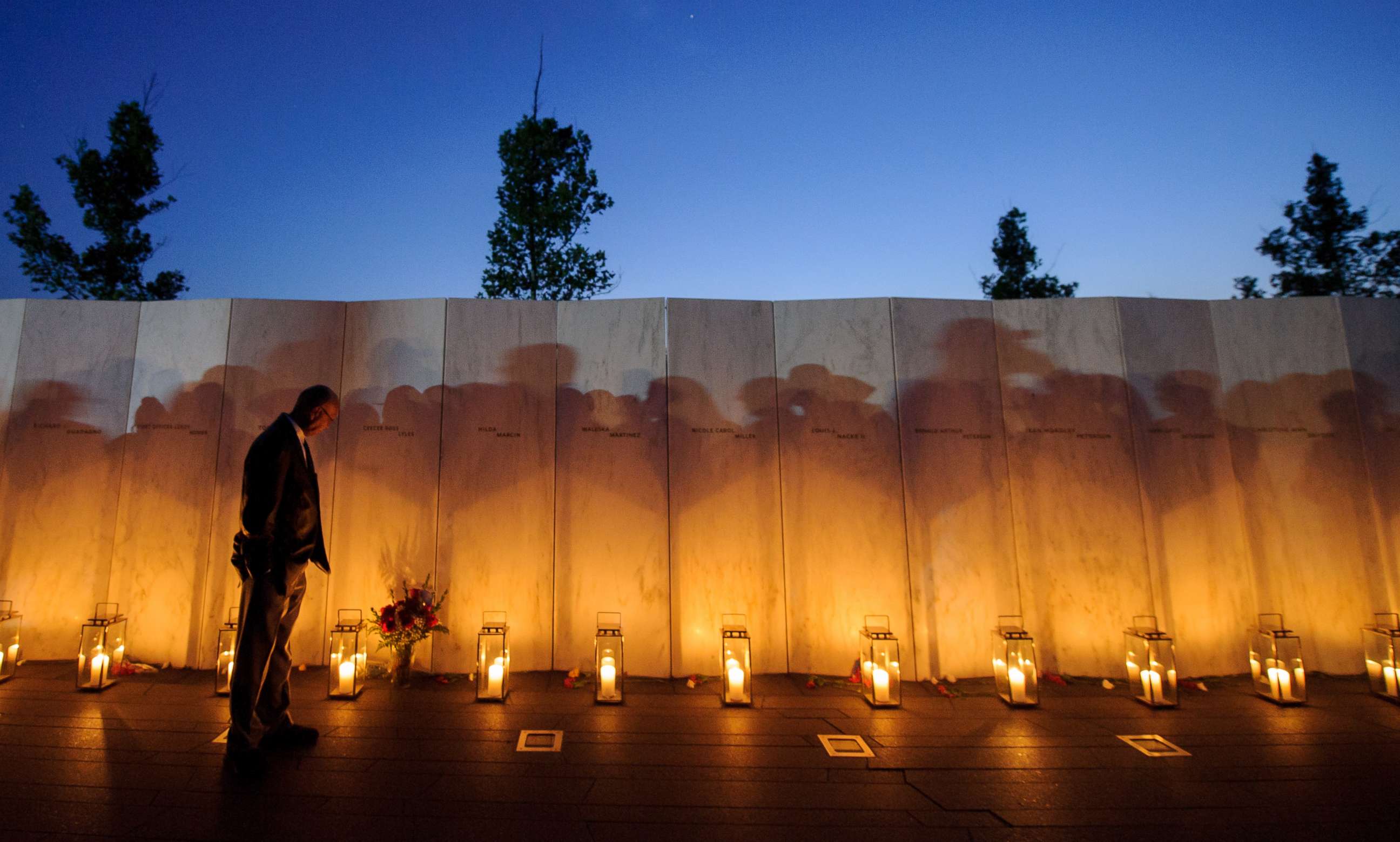 PHOTO: A man pauses before a name on the wall during the Flight 93 National Memorial'?s annual Luminaria on the eve of 16th Anniversary ceremony of the September 11th terrorist attacks, Sept. 10, 2017 in Shanksville, PA.