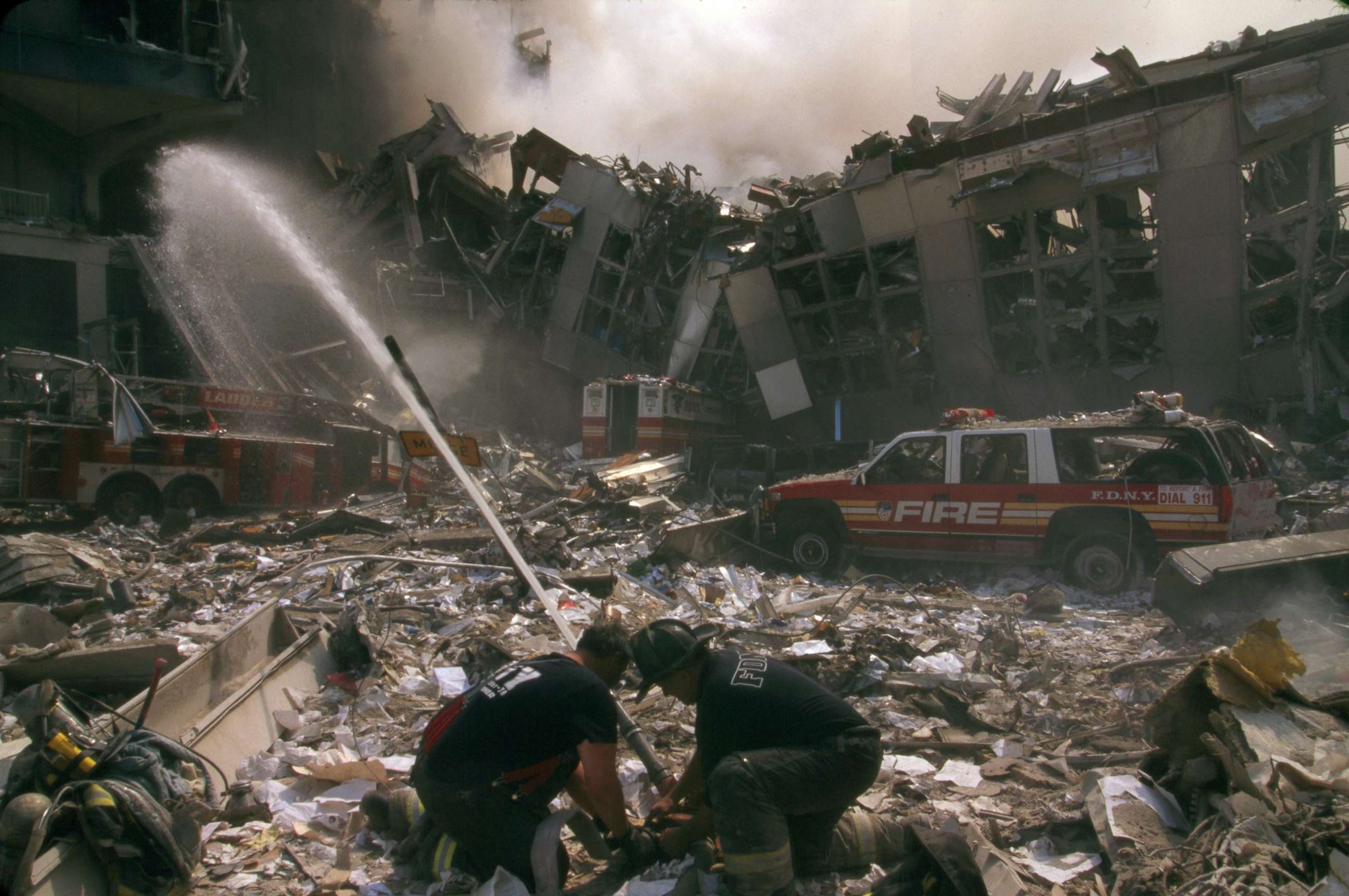 PHOTO: Fire fighters in the aftermath of the September 11th terrorist attack on the World Trade Center in New York City, 2001.