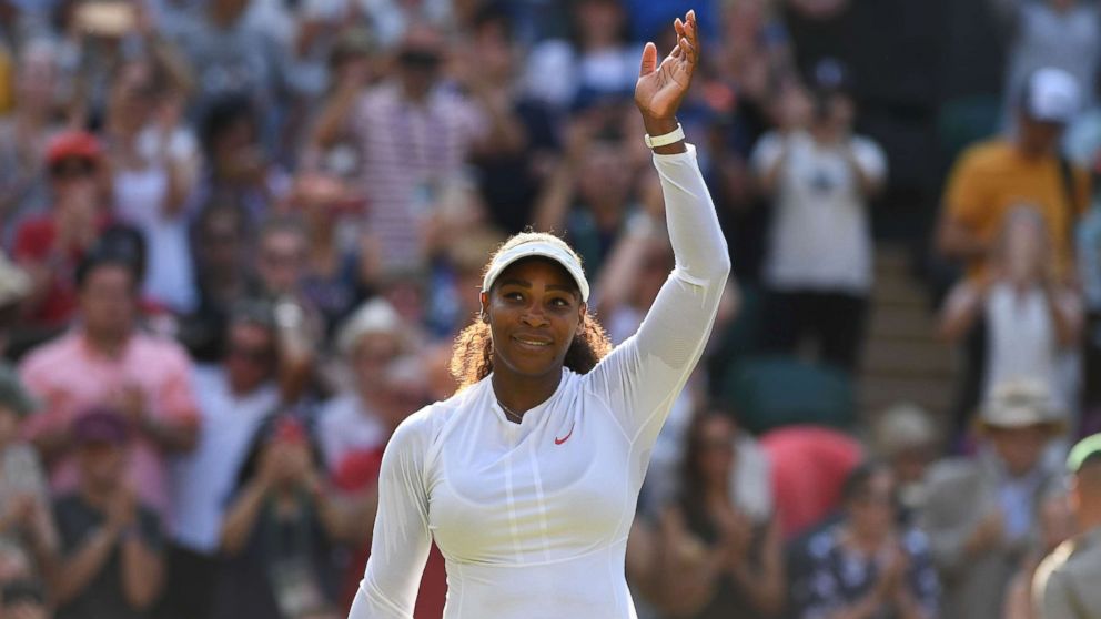 PHOTO: Serena Williams celebrates after beating France's Kristina Mladenovic 7-5, 7-6 in their women's singles third round match on the fifth day of the 2018 Wimbledon Championships, southwest London,  July 6, 2018. 
