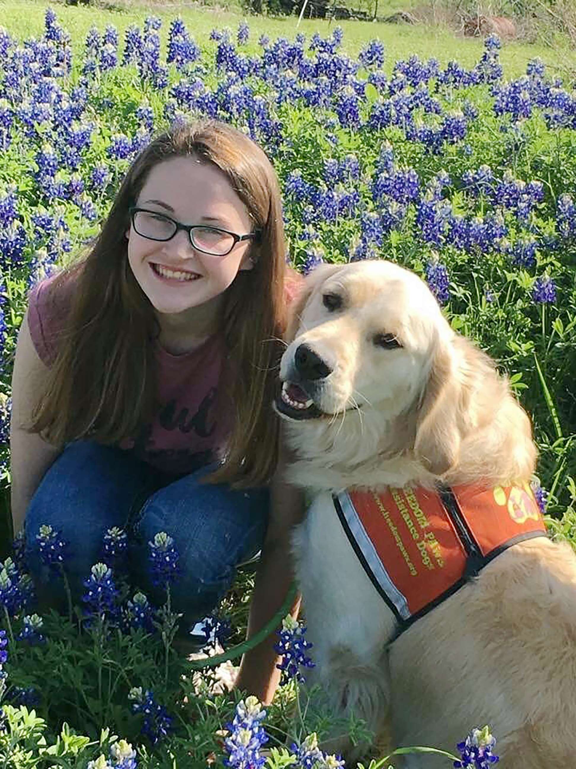 PHOTO: Hannah Westmoreland is pictured with her service dog Journey.