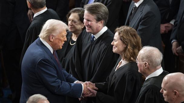President Donald Trump greets Supreme Court Justices Elena Kagan, Brett Kavanaugh, and Amy Coney Barrett, as he arrives to address a joint session of the United States Congress in Washington, Mar. 4, 2025.