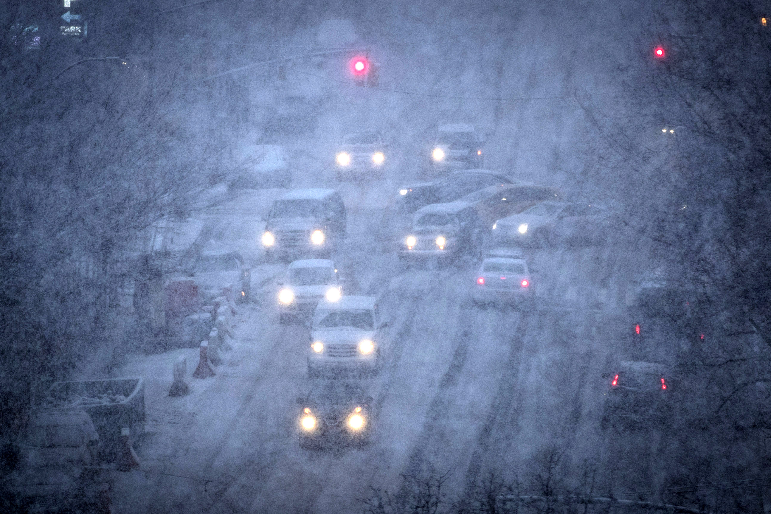 PHOTO: Vehicles navigate the road conditions on Atlantic Avenue in Brooklyn during a snowstorm, March 7, 2018, in New York City. 