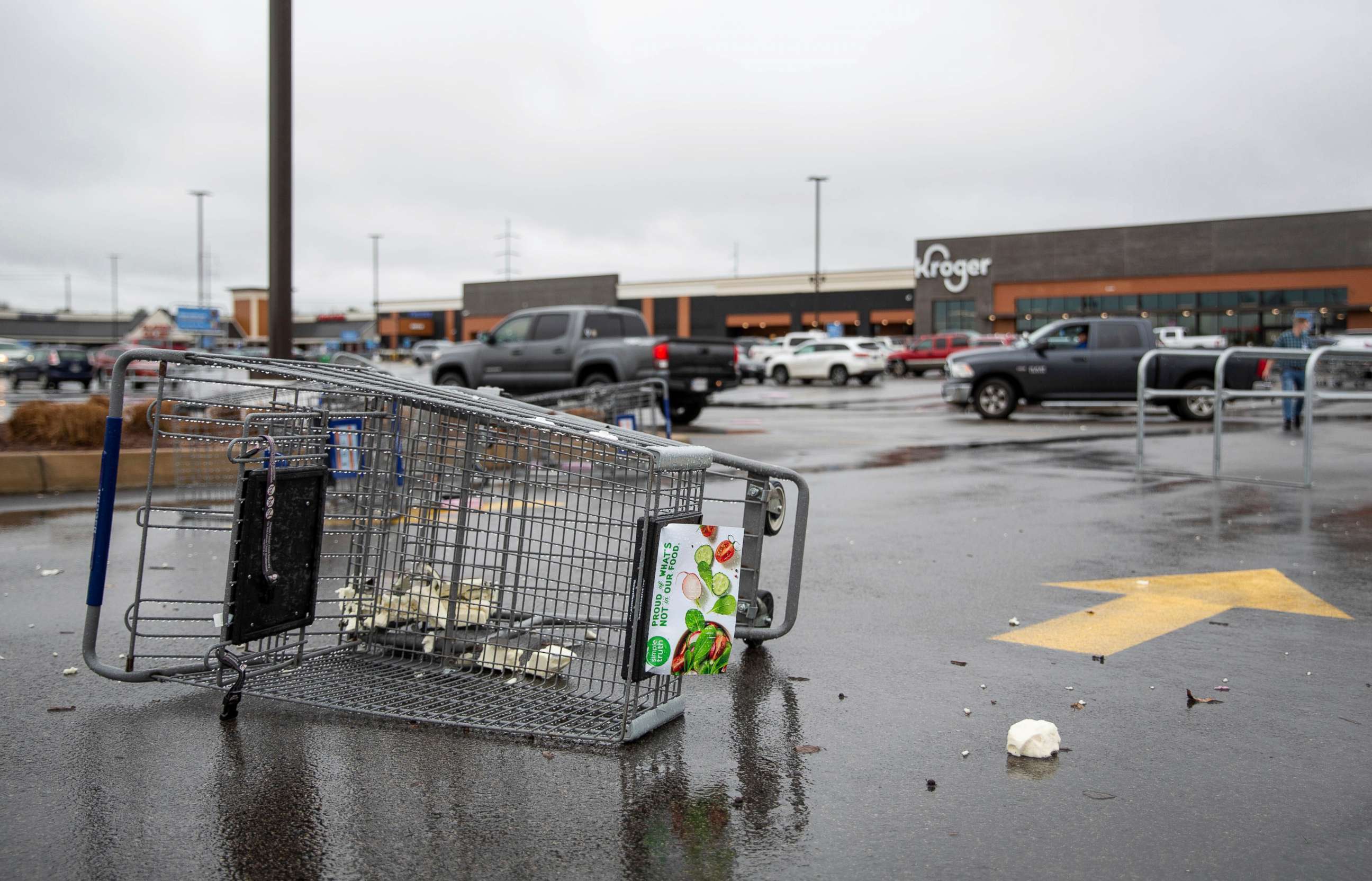 PHOTO: Shopping carts sit toppled over around a grocery store's parking lot in Bowling Green, Ky., Jan. 1, 2022.