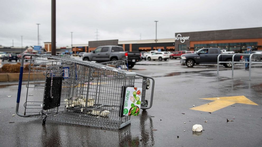 PHOTO: Shopping carts sit toppled over around a grocery store's parking lot in Bowling Green, Ky., Jan. 1, 2022.