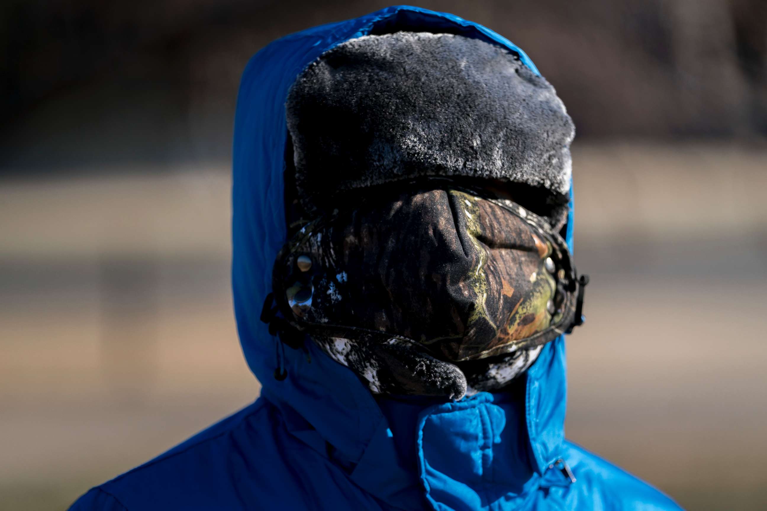 PHOTO: A boy has his face bundled against temperatures in the teens on the National Mall, Dec. 28, 2017, in Washington. 