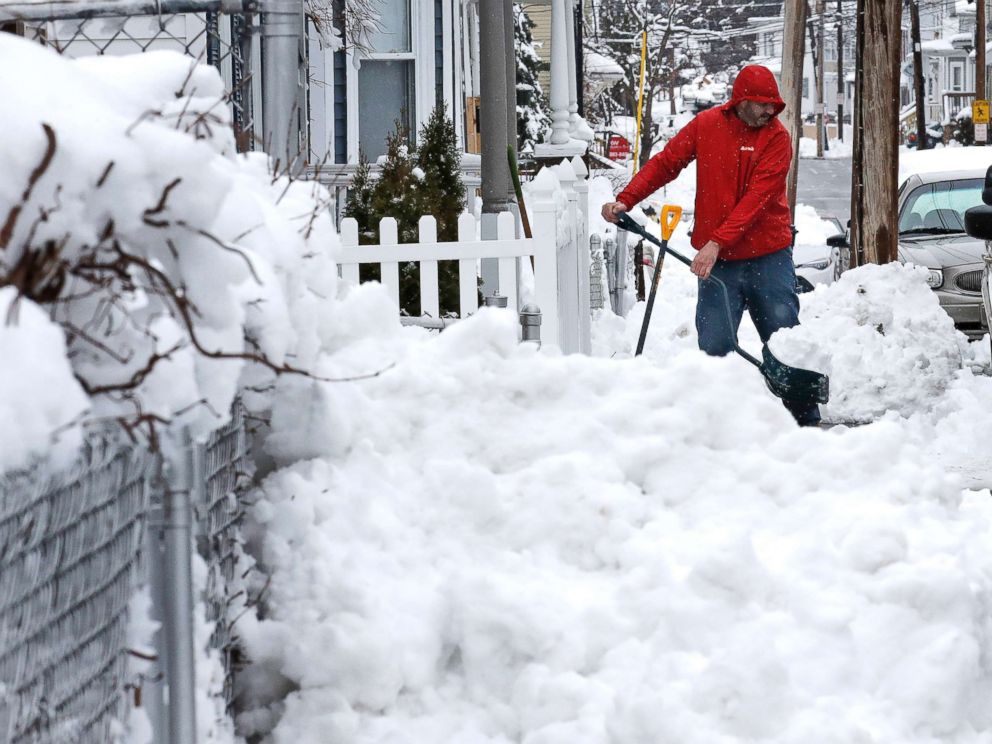 PHOTO: Albert Rodriguez shovels a sidewalk in Haverhill, Mass., March 8, 2018.