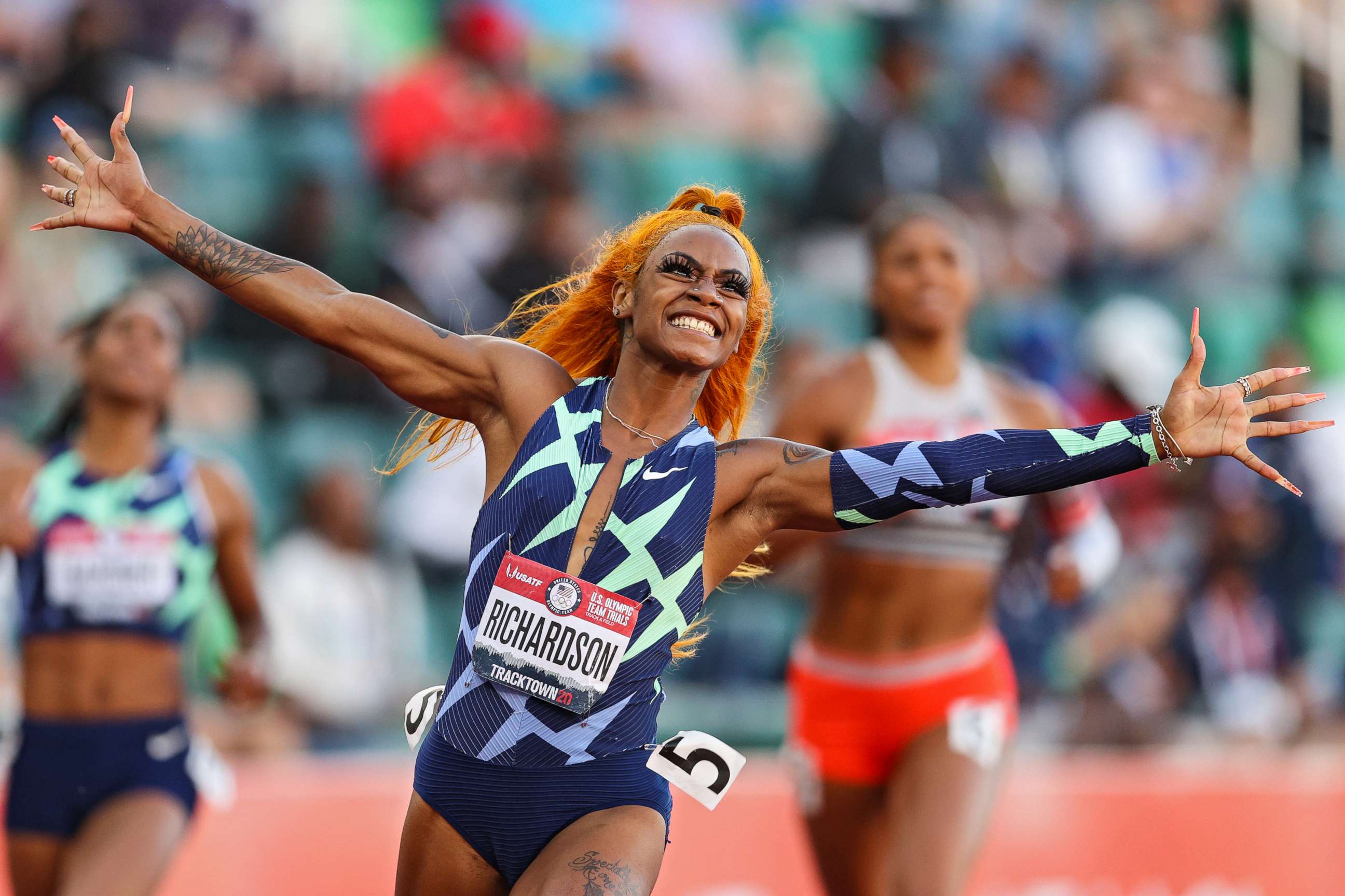 PHOTO: Sha'Carri Richardson celebrates winning the Women's 100 Meter final on day 2 of the 2020 U.S. Olympic Track &amp; Field Team Trials at Hayward Field on June 19, 2021, in Eugene, Ore.