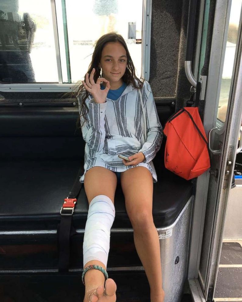 PHOTO: Lola Pollina is treated by first responders after suffering a possible shark bite off of Fire Island in New York, July 18, 2018.