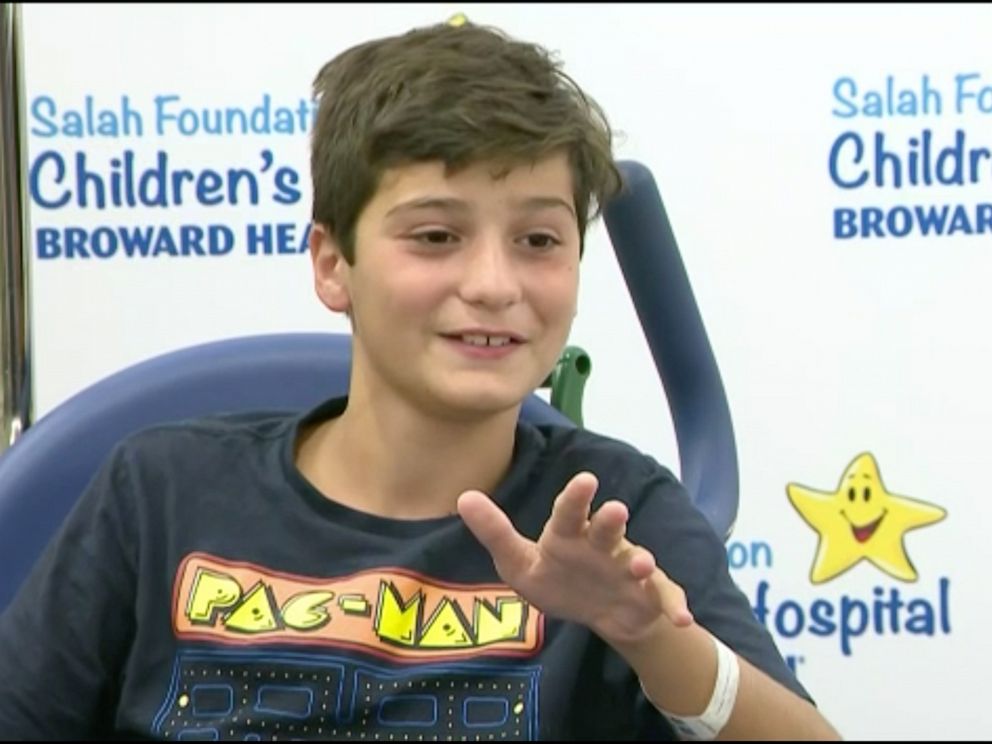PHOTO: Christian Mariani spoke to the press after being attacked by a shark.