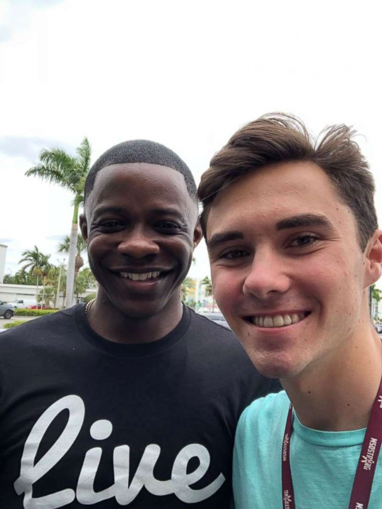 Parkland shooting survivor and activist David Hogg, right, poses with Waffle House shooting hero James Shaw Jr. after a meeting on May 12, 2018.