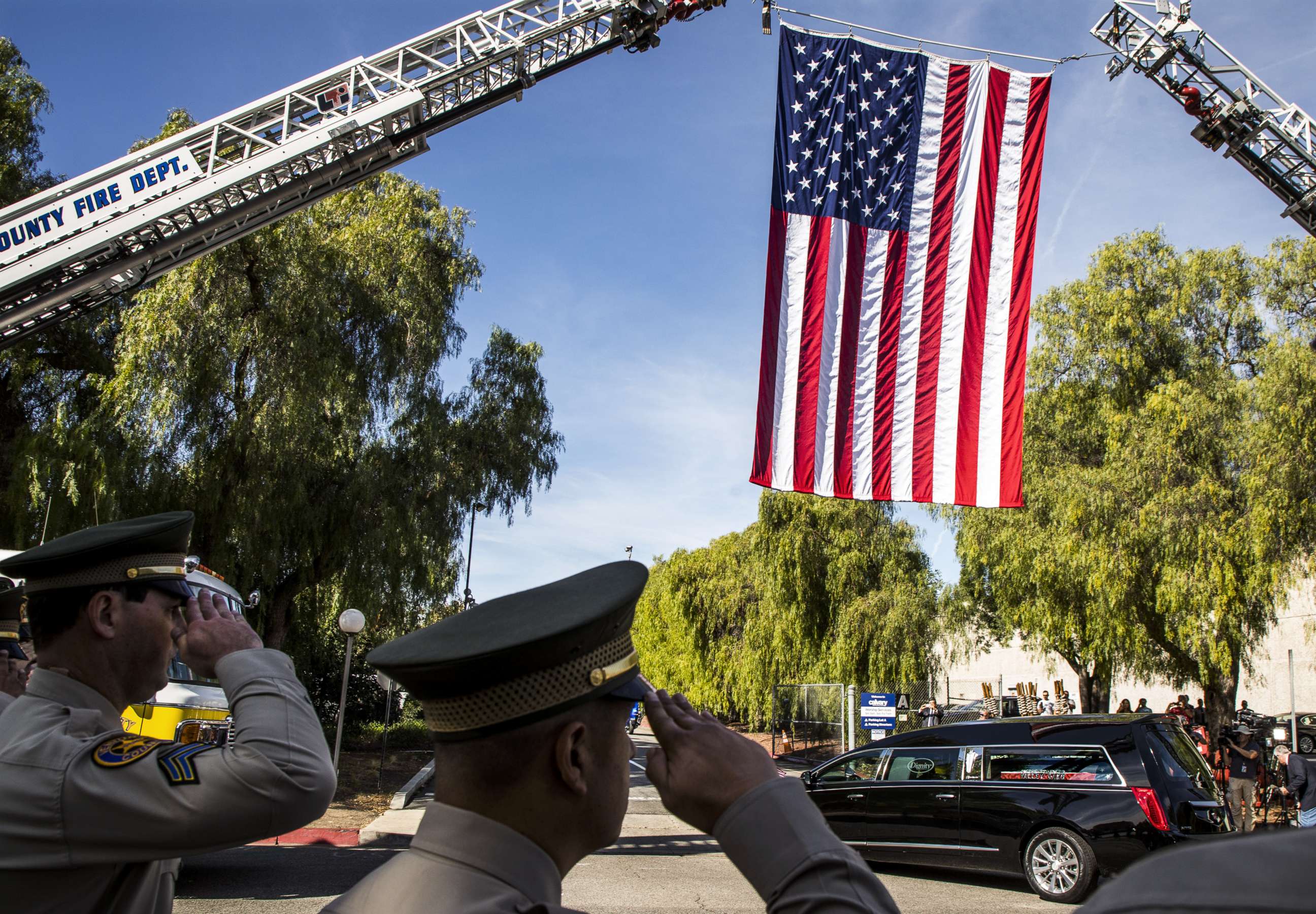 PHOTO: A hearse carrying the coffin of Ventura County Sheriff Sgt. Ron Helus is driven into The Calvary Community Church for his memorial service, Nov. 15, 2018, in Westlake, Calif. 