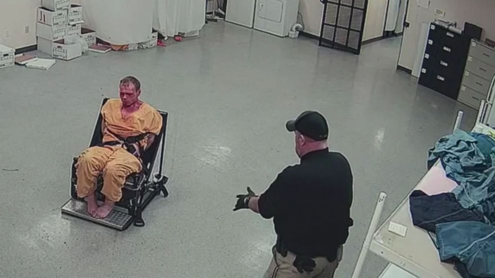 PHOTO: In this screen grab taken from a video, Pike County Sheriff Jeremy Mooney is shown with restrained prisoner, Thomas Friend.