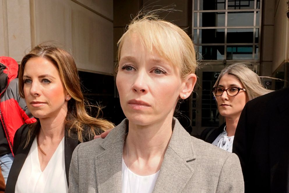 PHOTO: In this April 13, 2022, file photo, Sherri Papini of Redding leaves the federal courthouse accompanied by her attorney, William Portanova, right, after her arraignment in Sacramento, Calif.