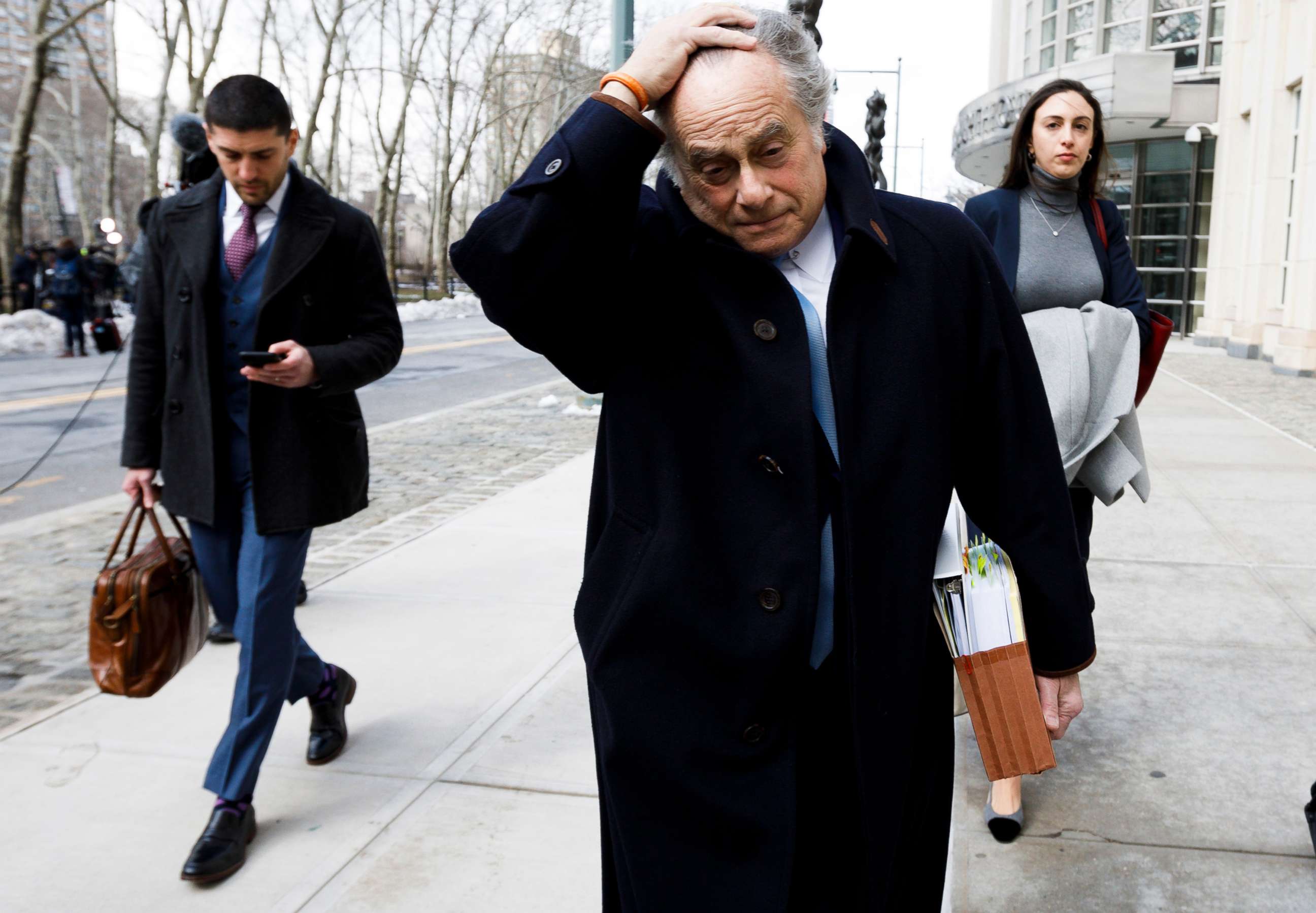 PHOTO: Attorney Benjamin Brafman leaves a United States Courthouse after his client, former pharmaceutical executive Martin Shkreli, was sentenced to seven years in prison for securities fraud in New York, New York, March 9, 2018.