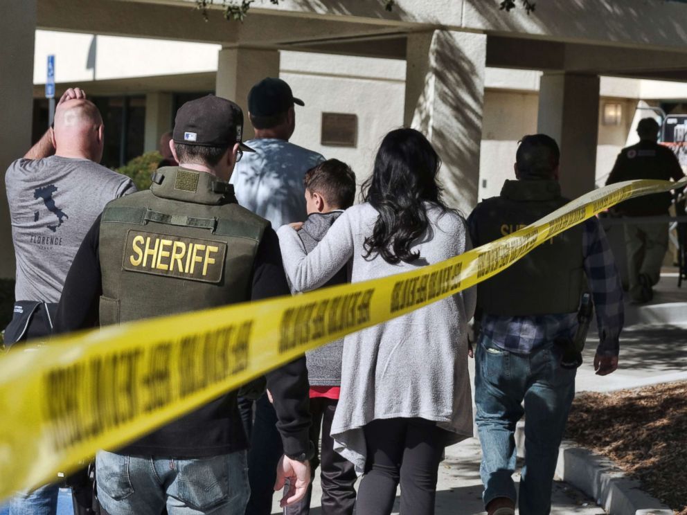 PHOTO: Family members are led into the Thousand Oaks Teen Center where families have gathered after a deadly shooting at a bar in Thousand Oaks, Calif., Nov. 8, 2018.