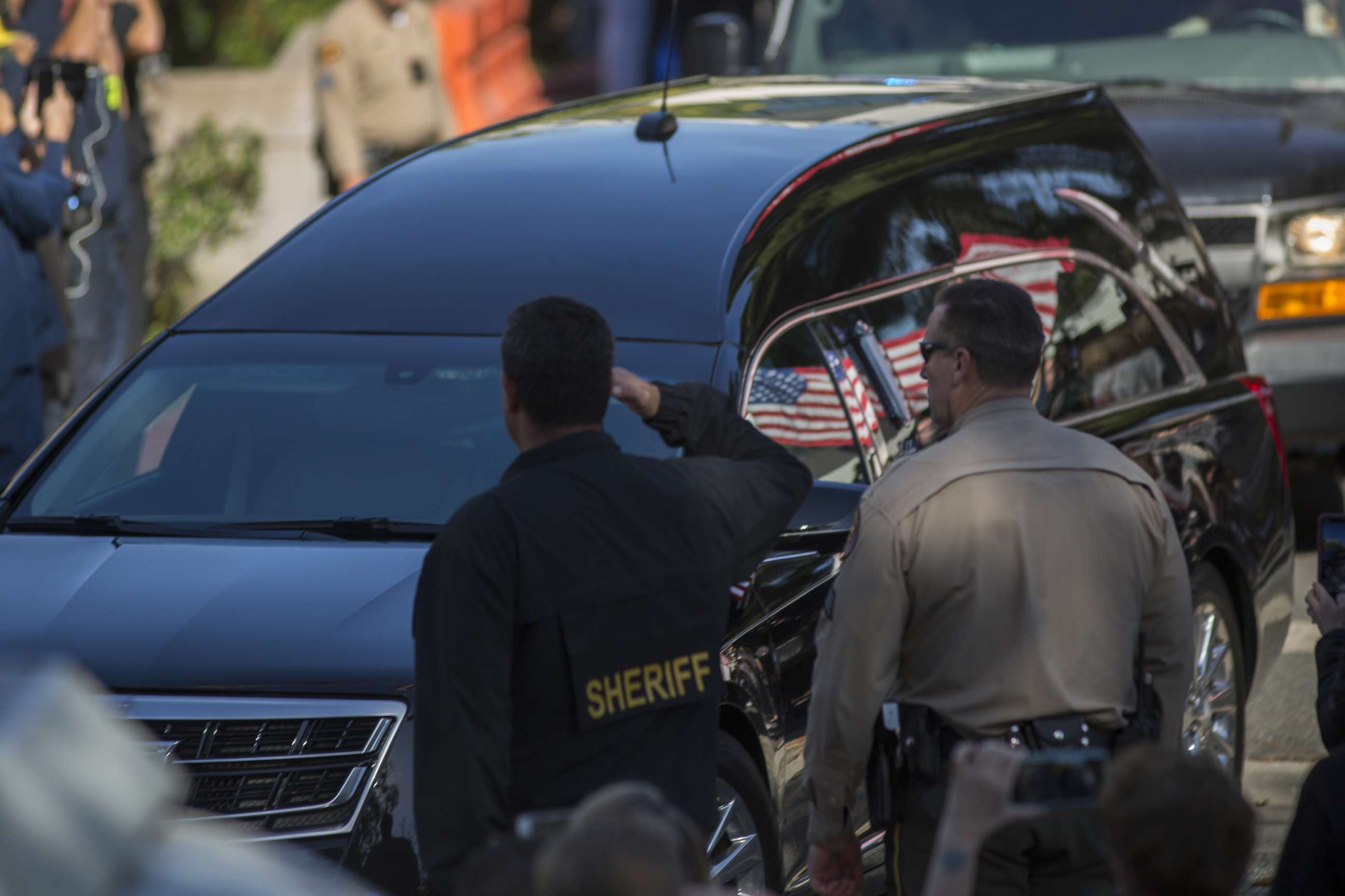 PHOTO: The procession carrying the body of Ventura County Sheriffs Sgt. Ron Helus, who was killed in a mass shooting at the Borderline Bar and Grill, leaves Los Robles Hospital, Nov. 8, 2018, in Thousand Oaks, Calif.