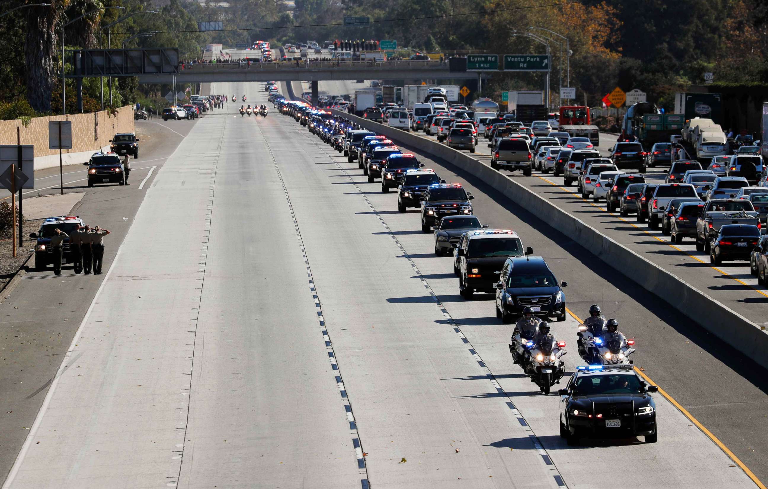 PHOTO: A procession for the body of Sergeant Ron Helus, who died in a shooting incident at a Thousand Oaks bar,  drives down Ventura Highway 101 in Thousand Oaks, Calif., Nov. 8, 2018. 