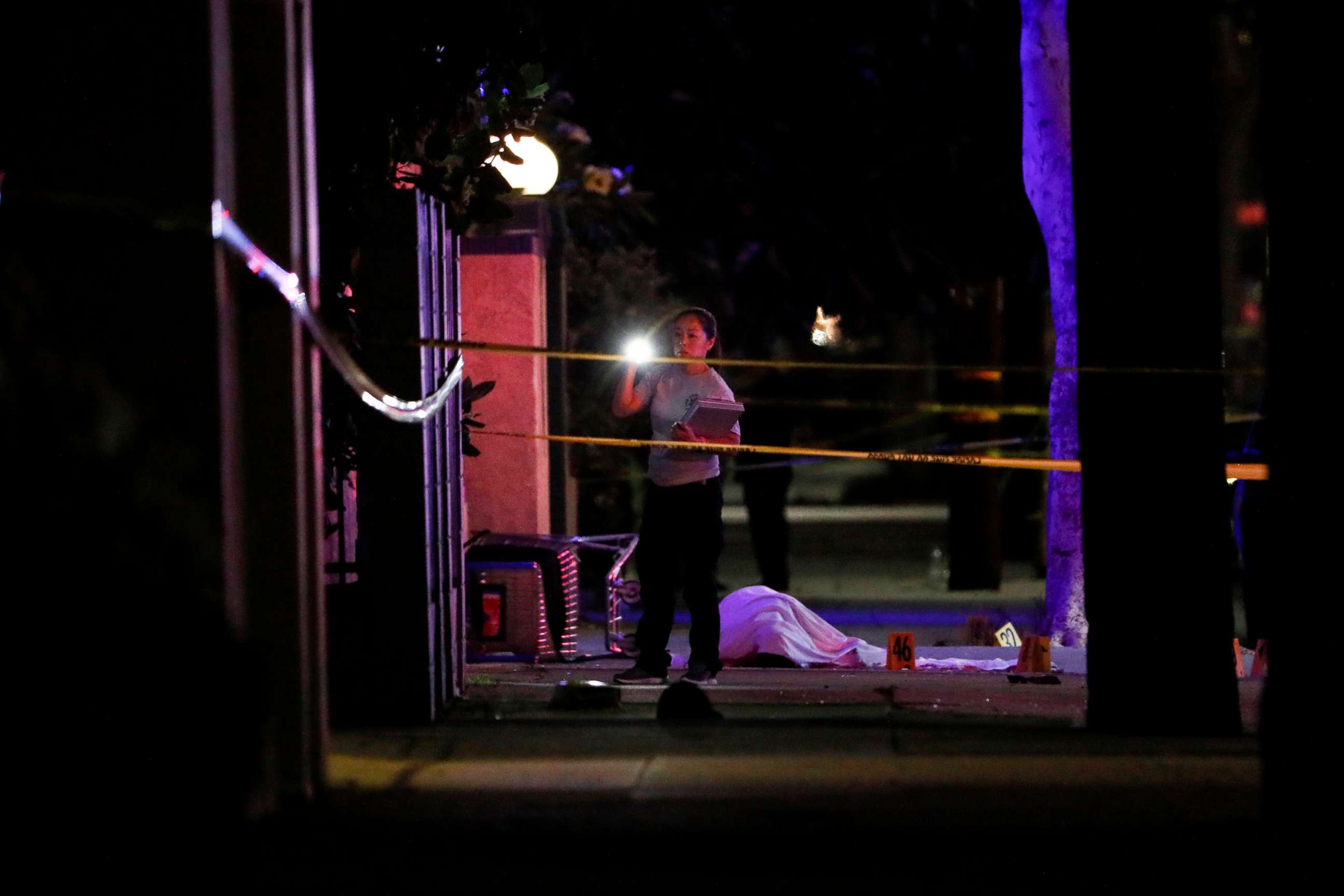 PHOTO: Investigators at a scene after a shooting on June 14, 2022 in El Monte, Calif.