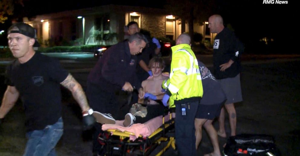 PHOTO: A victim is treated near the scene of a shooting, Nov. 7, 2018, in Thousand Oaks, Calif.