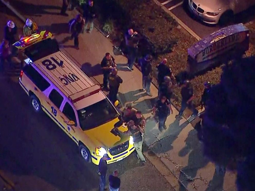 PHOTO: Officers near a police SUV in the vicinity of a shooting in Thousand Oaks, Calif., Nov. 8, 2018.