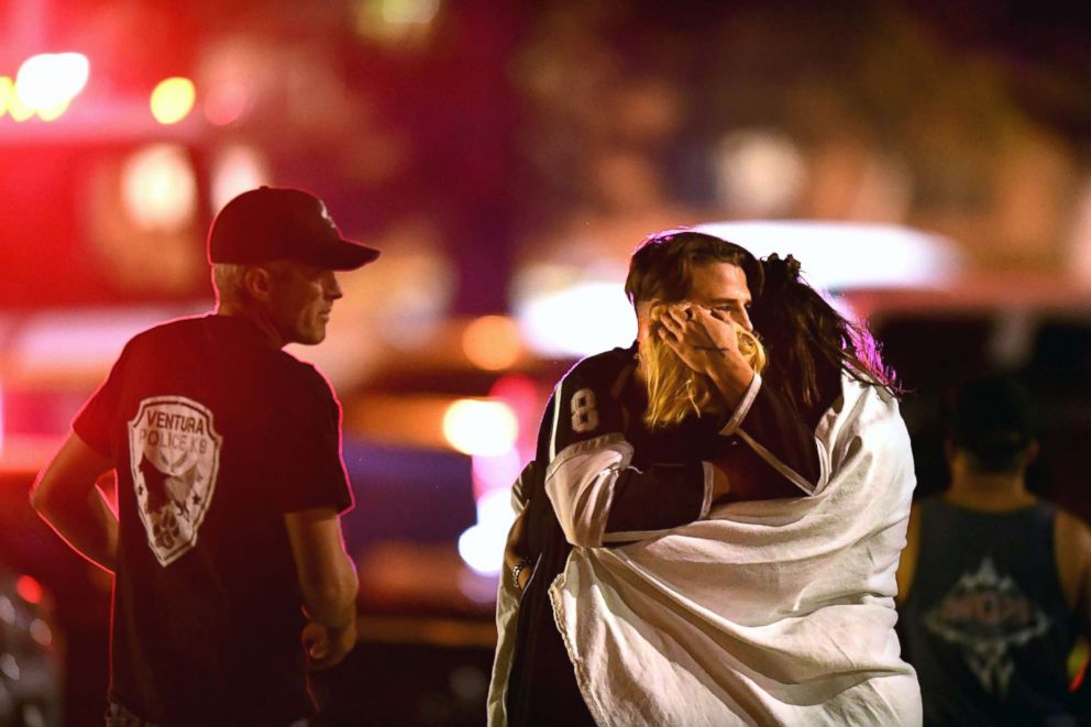 PHOTO: People comfort each other, Nov. 8, 2018, after a mass shooting at the Borderline Bar &amp; Grill in Thousand Oaks late Wednesday night.