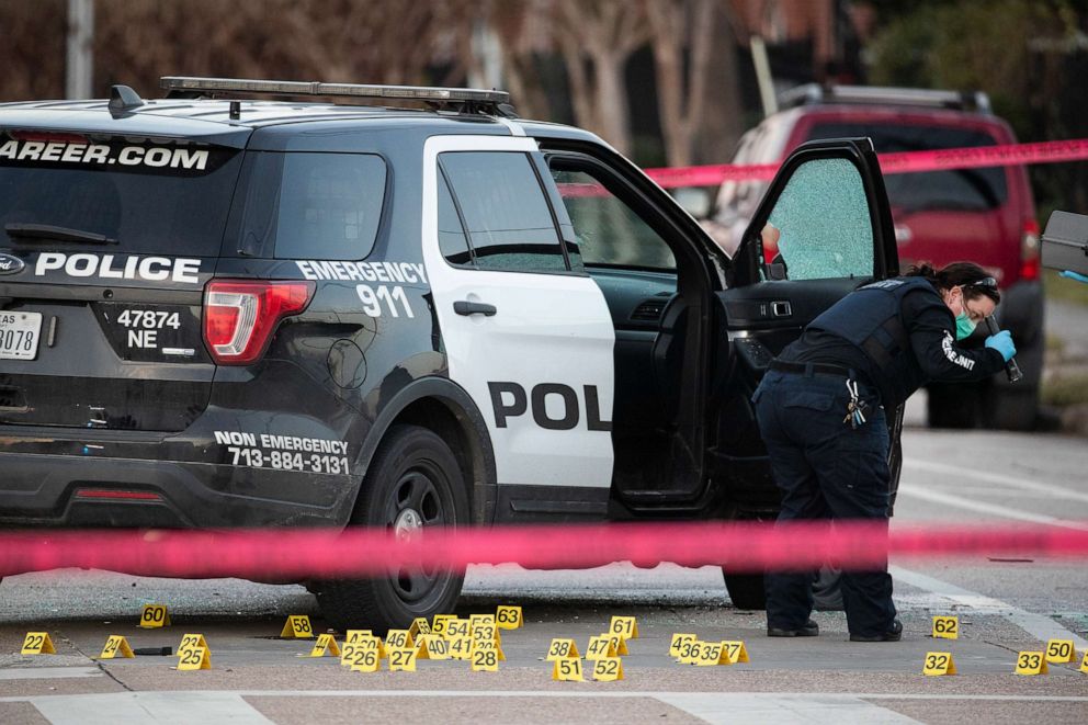 PHOTO: Police investigate the scene where three Houston police officers were shot near the intersection of McGowen and Hutchins, Thursday, Jan. 27, 2022, in Houston.