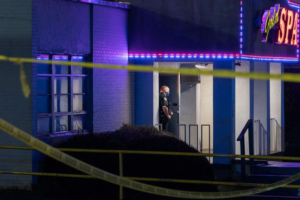 PHOTO: A police officer stands outside a spa on March 16, 2021, in Atlanta.