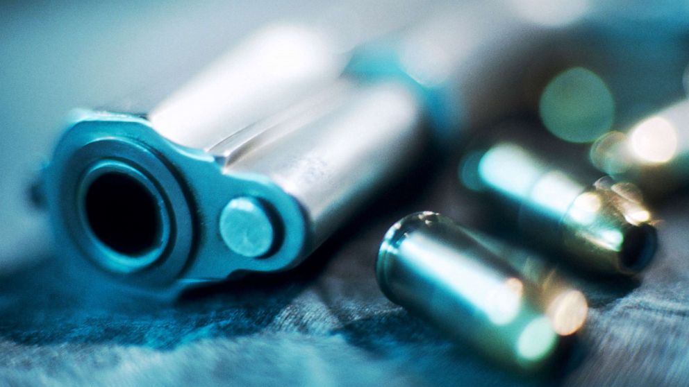 PHOTO: Bullets rest next to the barrel of a gun in an undated stock image.